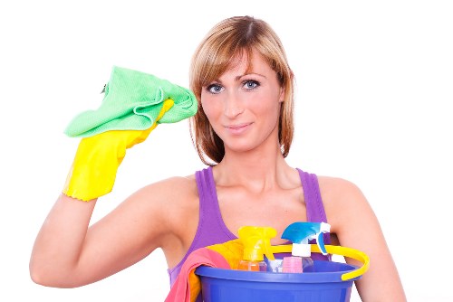 Professional home cleaners in SE11 working in a modern living room