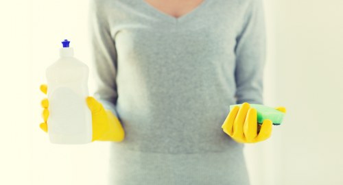 Technician applying professional cleaning methods with trained procedures